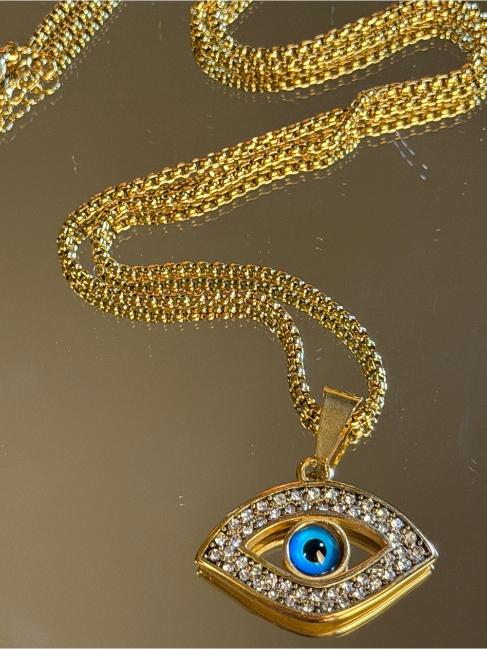 Gold Evil Eye Pendant Necklace with Blue Center